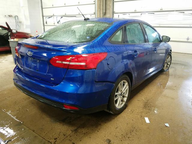 Photo 3 VIN: 1FADP3F2XJL312730 - FORD FOCUS SE 