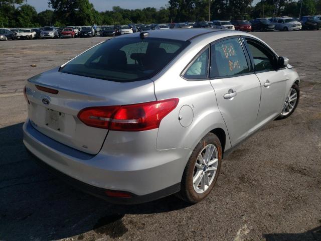 Photo 3 VIN: 1FADP3F2XJL316731 - FORD FOCUS SE 