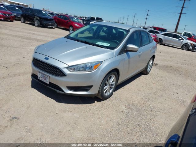 Photo 1 VIN: 1FADP3F2XJL328765 - FORD FOCUS 