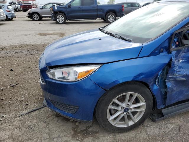 Photo 8 VIN: 1FADP3F2XJL330063 - FORD FOCUS SE 