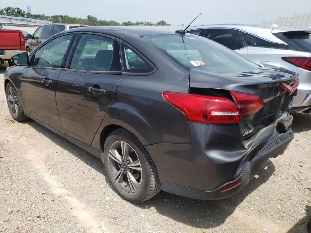 Photo 2 VIN: 1FADP3FE0GL301447 - FORD FOCUS SE 