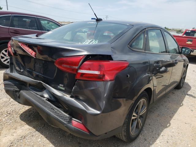 Photo 3 VIN: 1FADP3FE0GL301447 - FORD FOCUS SE 