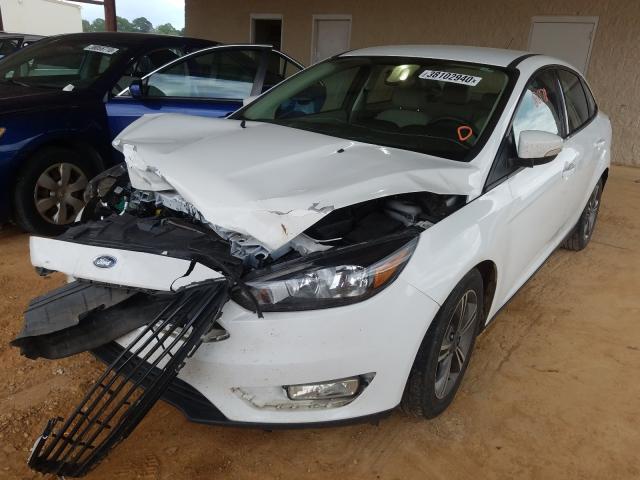 Photo 1 VIN: 1FADP3FE0HL293996 - FORD FOCUS SE 