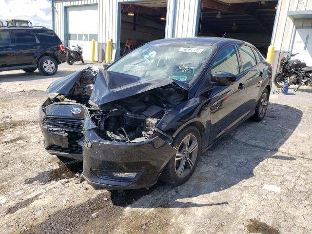 Photo 1 VIN: 1FADP3FE0JL208483 - FORD FOCUS SE 