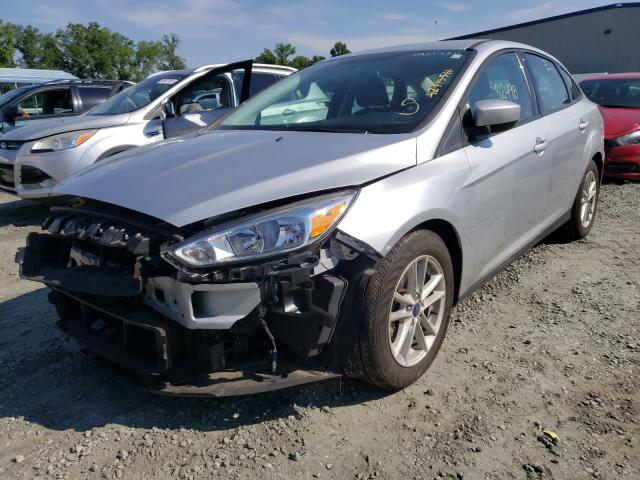 Photo 1 VIN: 1FADP3FE0JL226384 - FORD FOCUS SE 