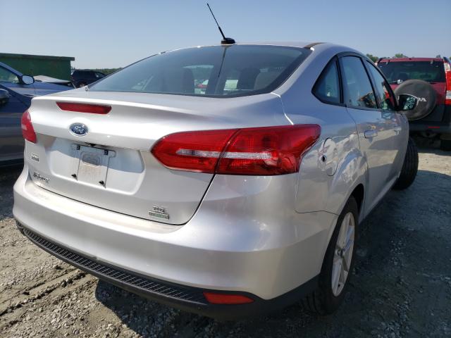 Photo 3 VIN: 1FADP3FE0JL226384 - FORD FOCUS SE 