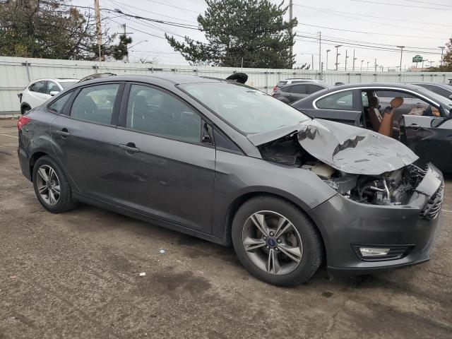 Photo 3 VIN: 1FADP3FE0JL267999 - FORD FOCUS SE 