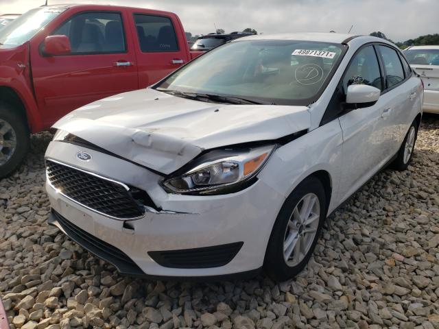 Photo 1 VIN: 1FADP3FE0JL291252 - FORD FOCUS SE 