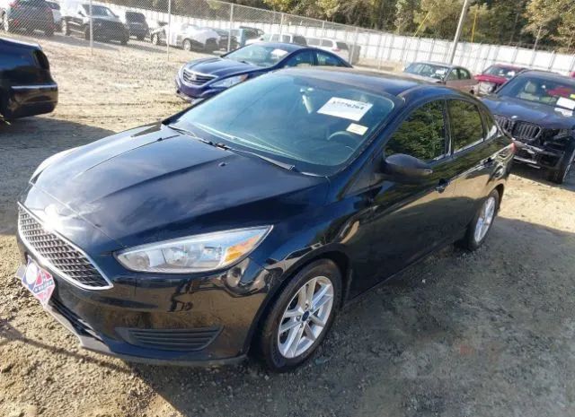 Photo 1 VIN: 1FADP3FE0JL299058 - FORD FOCUS 