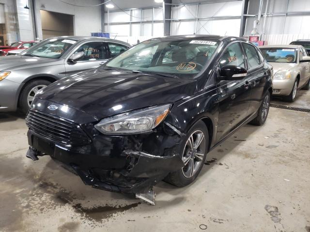 Photo 1 VIN: 1FADP3FE1GL203169 - FORD FOCUS SE 