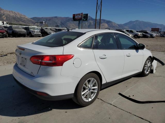 Photo 3 VIN: 1FADP3FE1GL344193 - FORD FOCUS SE 