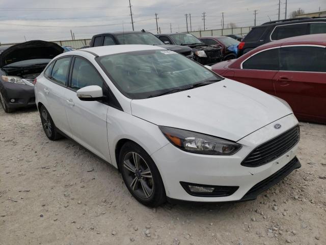 Photo 3 VIN: 1FADP3FE1GL404828 - FORD FOCUS SE 