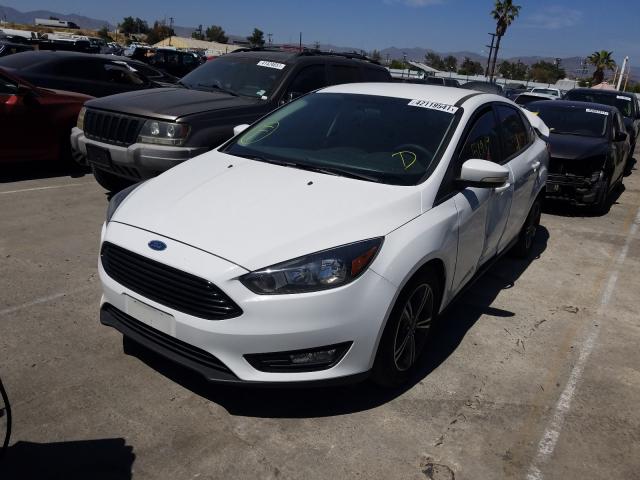 Photo 1 VIN: 1FADP3FE1HL292999 - FORD FOCUS 