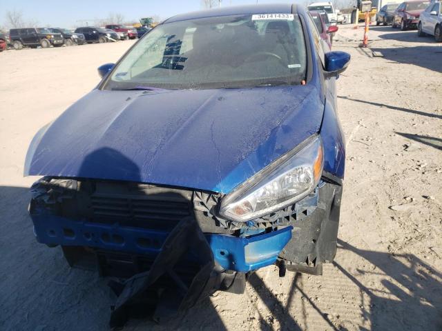 Photo 4 VIN: 1FADP3FE1JL210940 - FORD FOCUS SE 