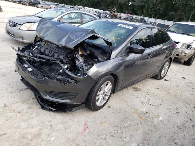 Photo 1 VIN: 1FADP3FE1JL227057 - FORD FOCUS SE 