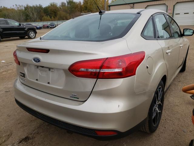 Photo 3 VIN: 1FADP3FE1JL257319 - FORD FOCUS 