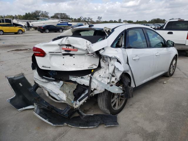 Photo 3 VIN: 1FADP3FE1JL306857 - FORD FOCUS SE 