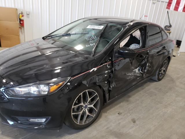 Photo 8 VIN: 1FADP3FE1JL308351 - FORD FOCUS SE 