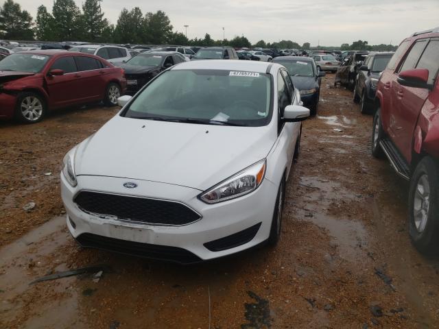 Photo 1 VIN: 1FADP3FE2GL221003 - FORD FOCUS SE 