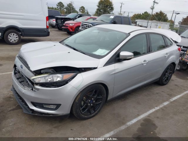 Photo 1 VIN: 1FADP3FE2GL385416 - FORD FOCUS 