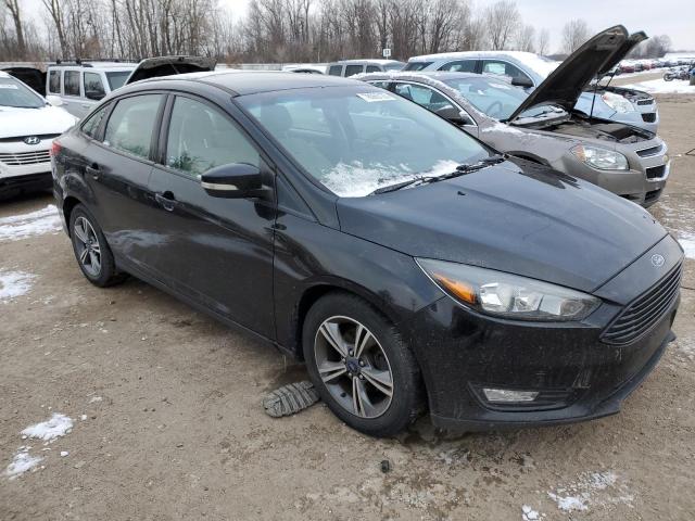 Photo 3 VIN: 1FADP3FE2HL208883 - FORD FOCUS 