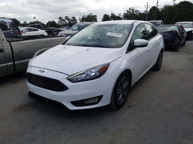 Photo 1 VIN: 1FADP3FE2HL238532 - FORD FOCUS SE 