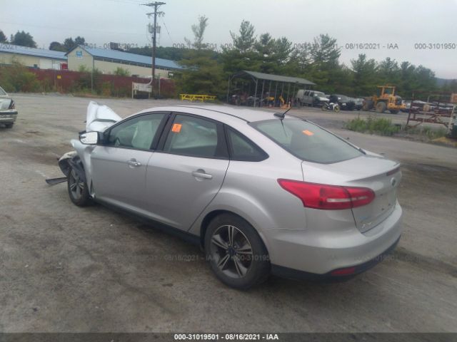 Photo 2 VIN: 1FADP3FE2HL281154 - FORD FOCUS 