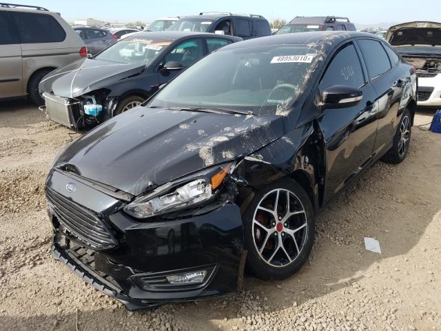 Photo 1 VIN: 1FADP3FE2HL295863 - FORD FOCUS SE 