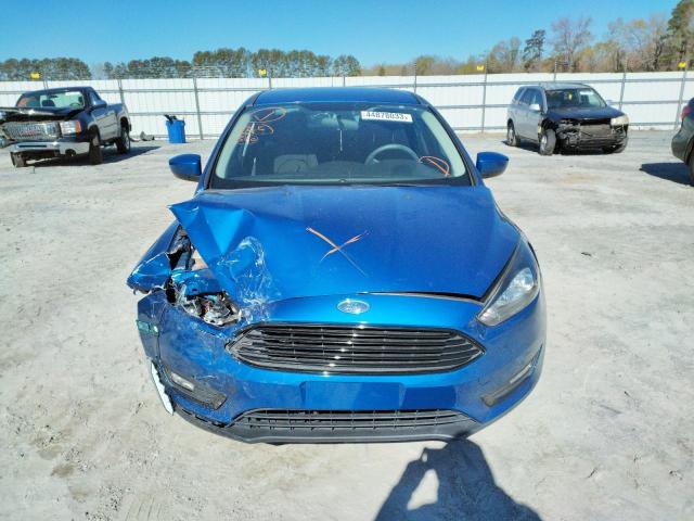 Photo 4 VIN: 1FADP3FE2JL200918 - FORD FOCUS SE 