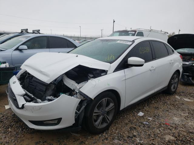 Photo 1 VIN: 1FADP3FE2JL260293 - FORD FOCUS SE 