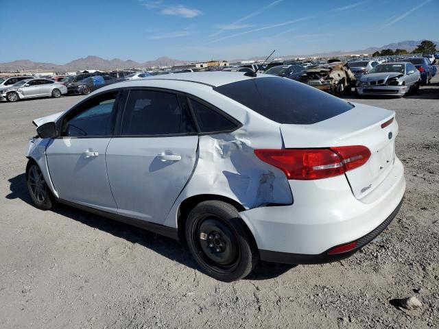 Photo 1 VIN: 1FADP3FE2JL304101 - FORD FOCUS SE 