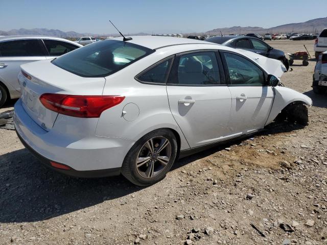 Photo 2 VIN: 1FADP3FE2JL313137 - FORD FOCUS 