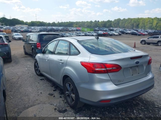 Photo 2 VIN: 1FADP3FE3GL210771 - FORD FOCUS 