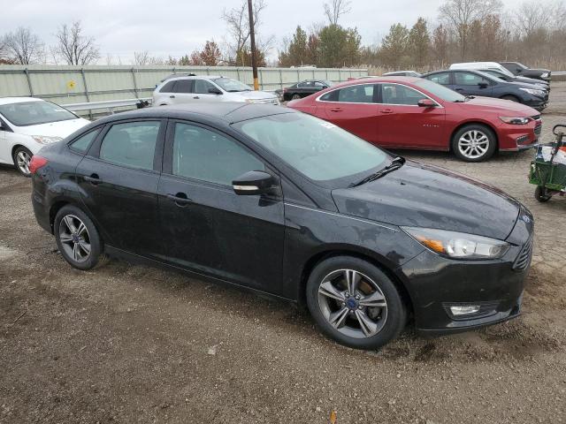 Photo 3 VIN: 1FADP3FE3GL224945 - FORD FOCUS 