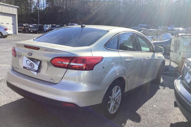 Photo 3 VIN: 1FADP3FE3JL214634 - FORD FOCUS 