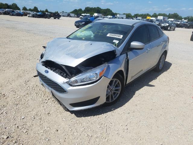 Photo 1 VIN: 1FADP3FE3JL216657 - FORD FOCUS SE 