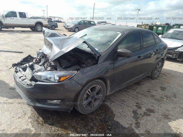 Photo 1 VIN: 1FADP3FE3JL240490 - FORD FOCUS 