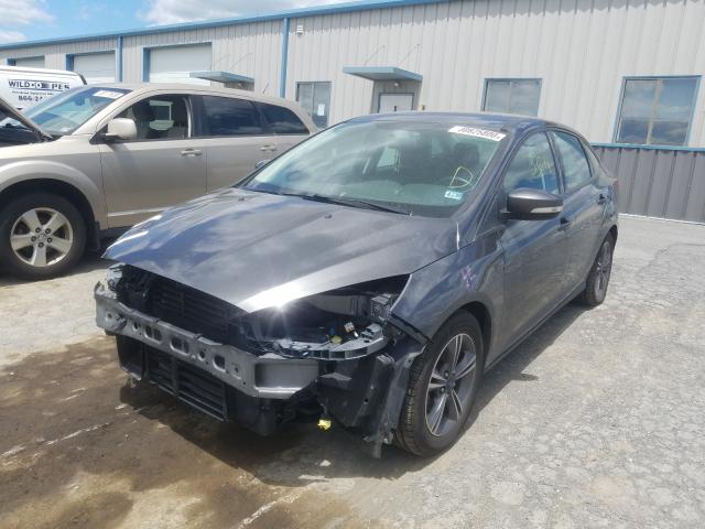 Photo 1 VIN: 1FADP3FE3JL266622 - FORD FOCUS SE 