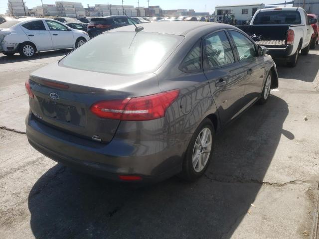 Photo 3 VIN: 1FADP3FE3JL270976 - FORD FOCUS SE 