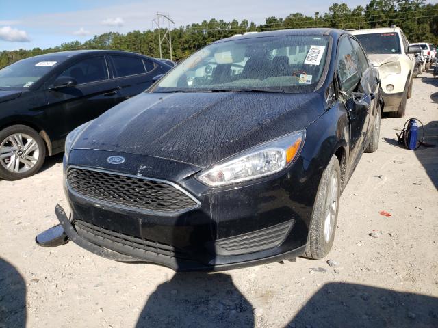 Photo 1 VIN: 1FADP3FE3JL299409 - FORD FOCUS SE 