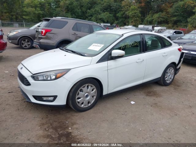 Photo 1 VIN: 1FADP3FE4GL200671 - FORD FOCUS 