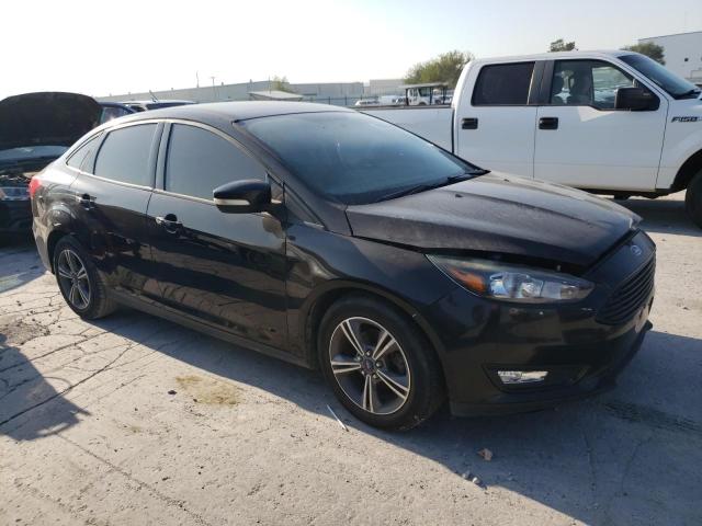 Photo 3 VIN: 1FADP3FE4GL306909 - FORD FOCUS SE 