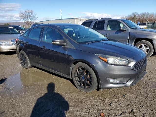 Photo 3 VIN: 1FADP3FE4GL381402 - FORD FOCUS SE 