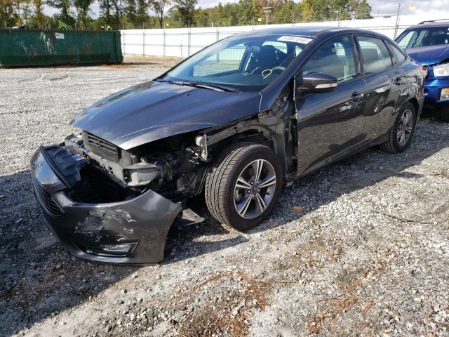 Photo 1 VIN: 1FADP3FE4HL281902 - FORD FOCUS SE 