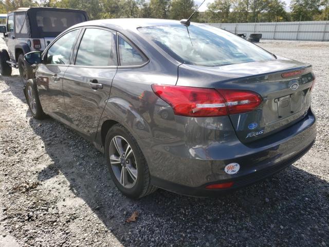 Photo 2 VIN: 1FADP3FE4HL281902 - FORD FOCUS SE 