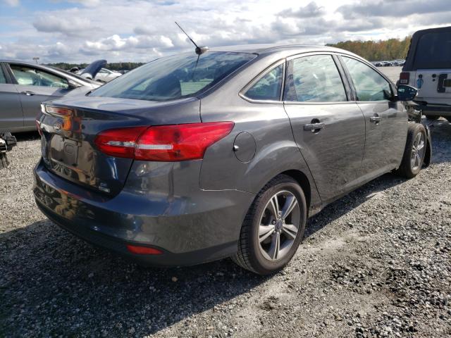 Photo 3 VIN: 1FADP3FE4HL281902 - FORD FOCUS SE 