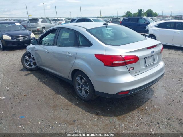 Photo 2 VIN: 1FADP3FE4HL295573 - FORD FOCUS 