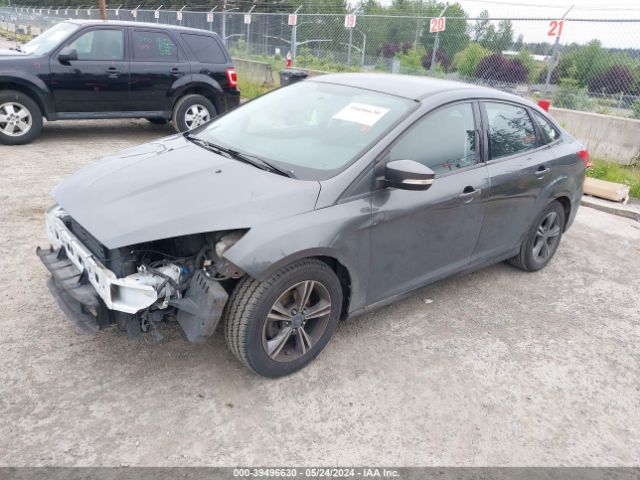 Photo 1 VIN: 1FADP3FE4HL299977 - FORD FOCUS 