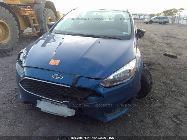 Photo 5 VIN: 1FADP3FE4JL222774 - FORD FOCUS 