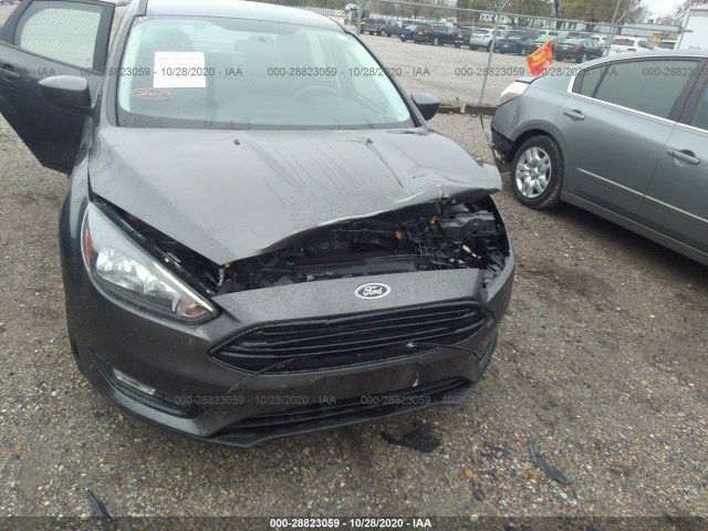 Photo 5 VIN: 1FADP3FE4JL293067 - FORD FOCUS 